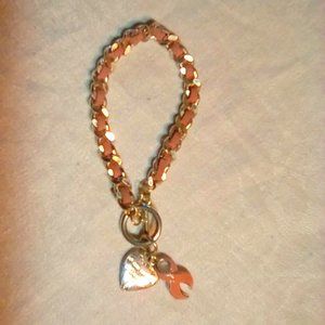 Pink and silver link bracelet with charms